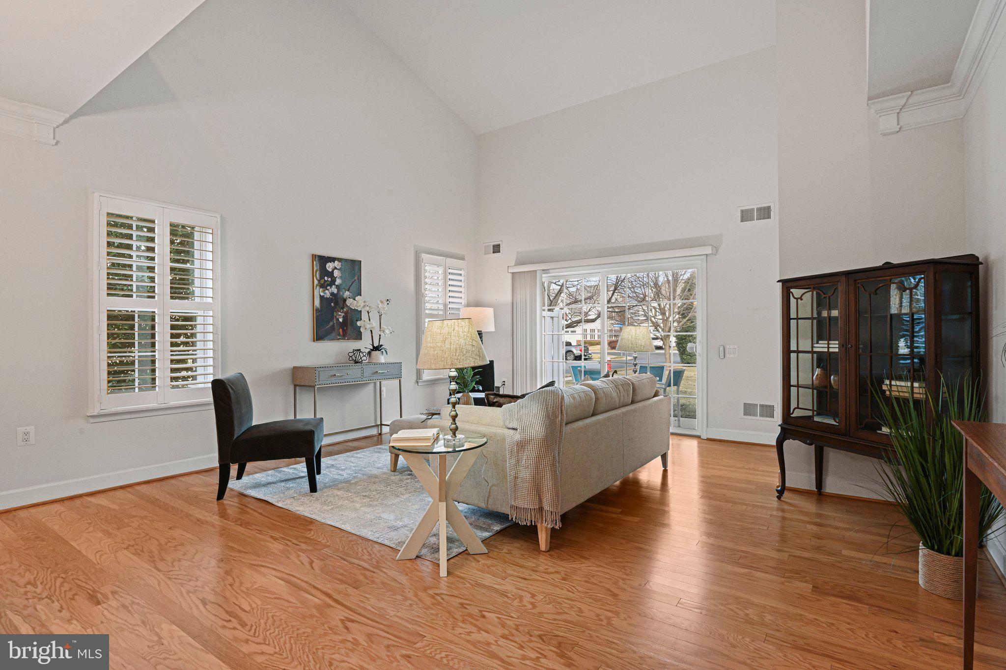 44482 Maltese Falcon Square Ashburn, VA 20147 - Photo 16 of 71 a living room with furniture and two window