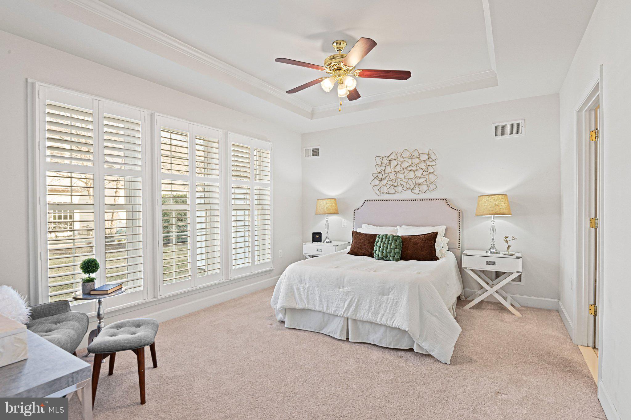 44482 Maltese Falcon Square Ashburn, VA 20147 - Photo 23 of 71 a bedroom with a bed and a large window