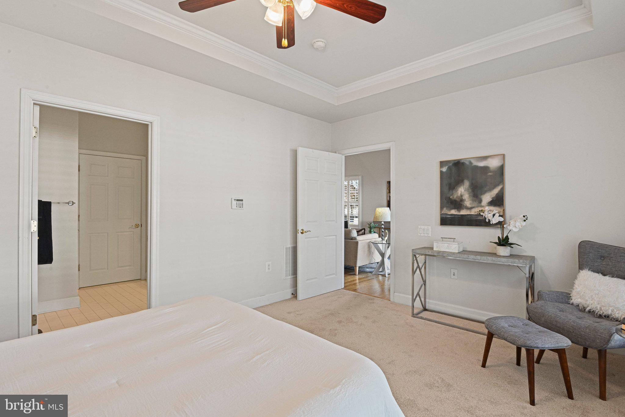 44482 Maltese Falcon Square Ashburn, VA 20147 - Photo 24 of 71 a bedroom with a bed and a chair