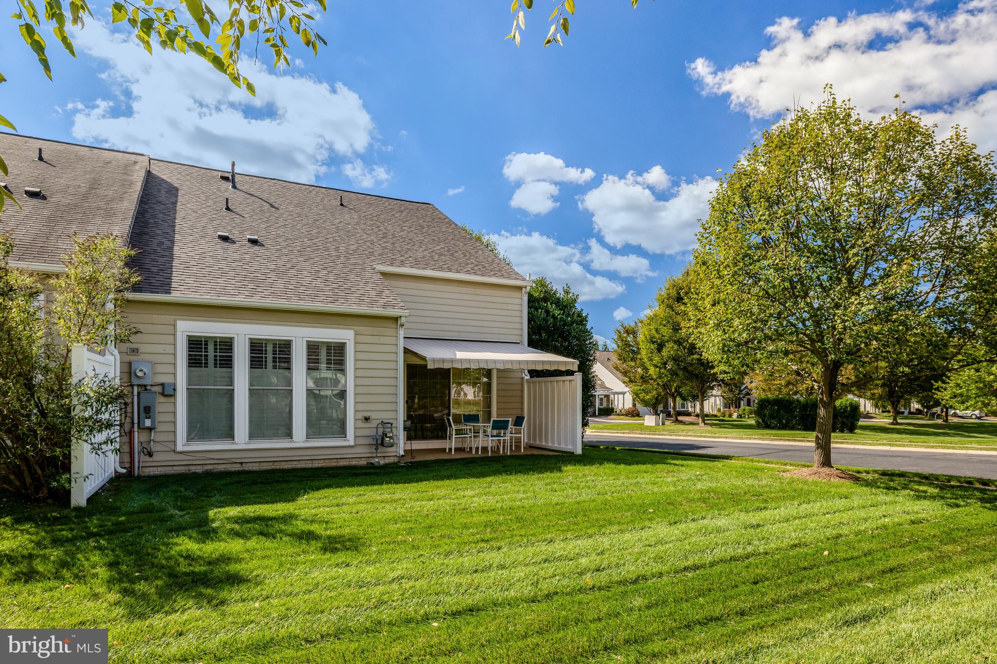 44482 Maltese Falcon Square Ashburn, VA 20147 - Photo 48 of 71 a front view of a house with a yard
