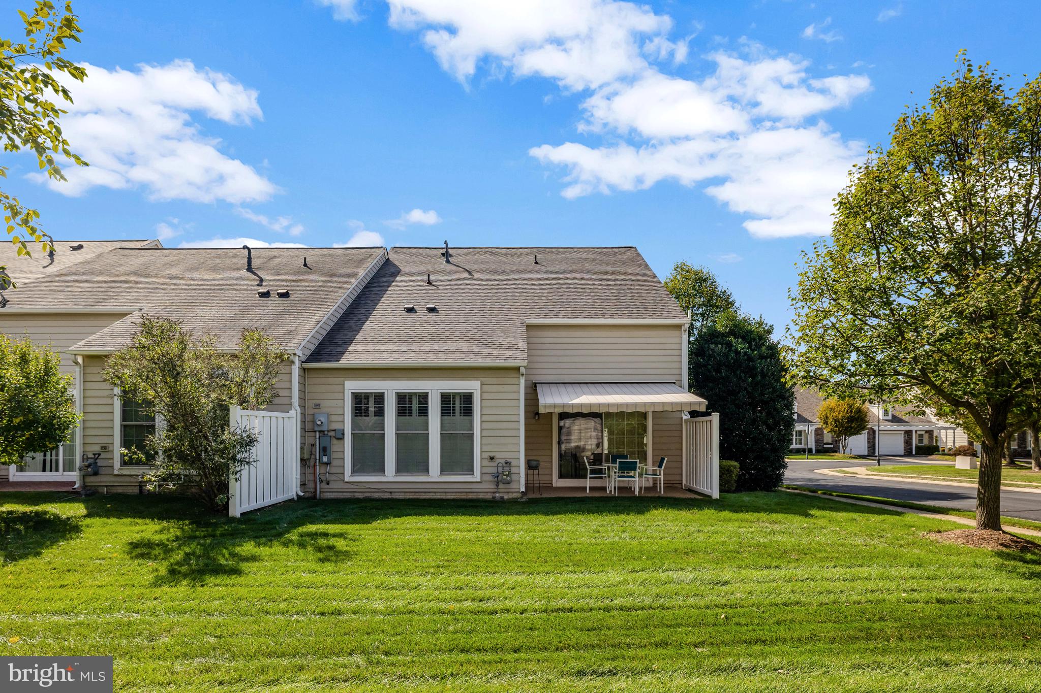 44482 Maltese Falcon Square Ashburn, VA 20147 - Photo 50 of 71 a front view of a house with a garden