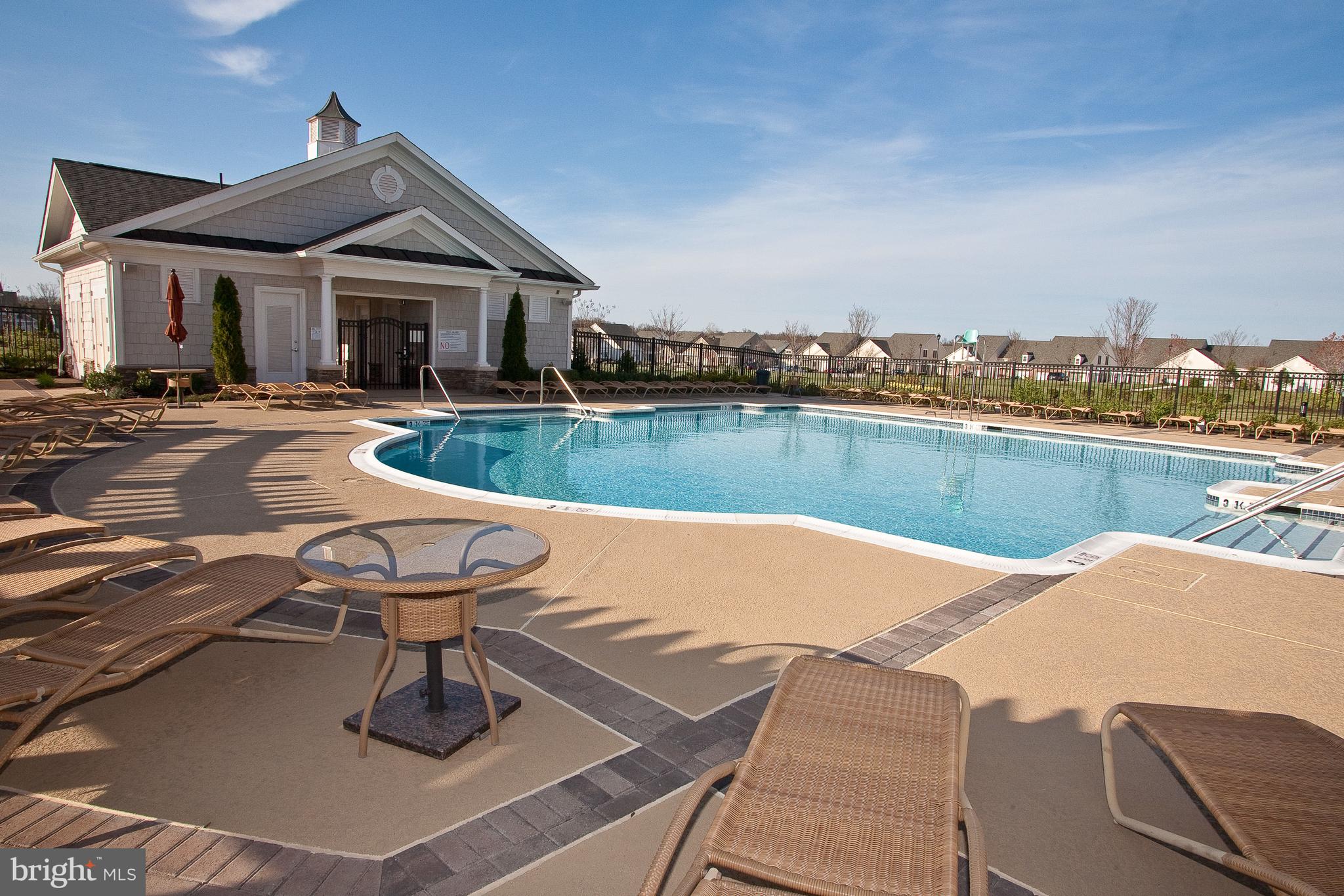 44482 Maltese Falcon Square Ashburn, VA 20147 - Photo 64 of 71 a view of a house with pool and chairs