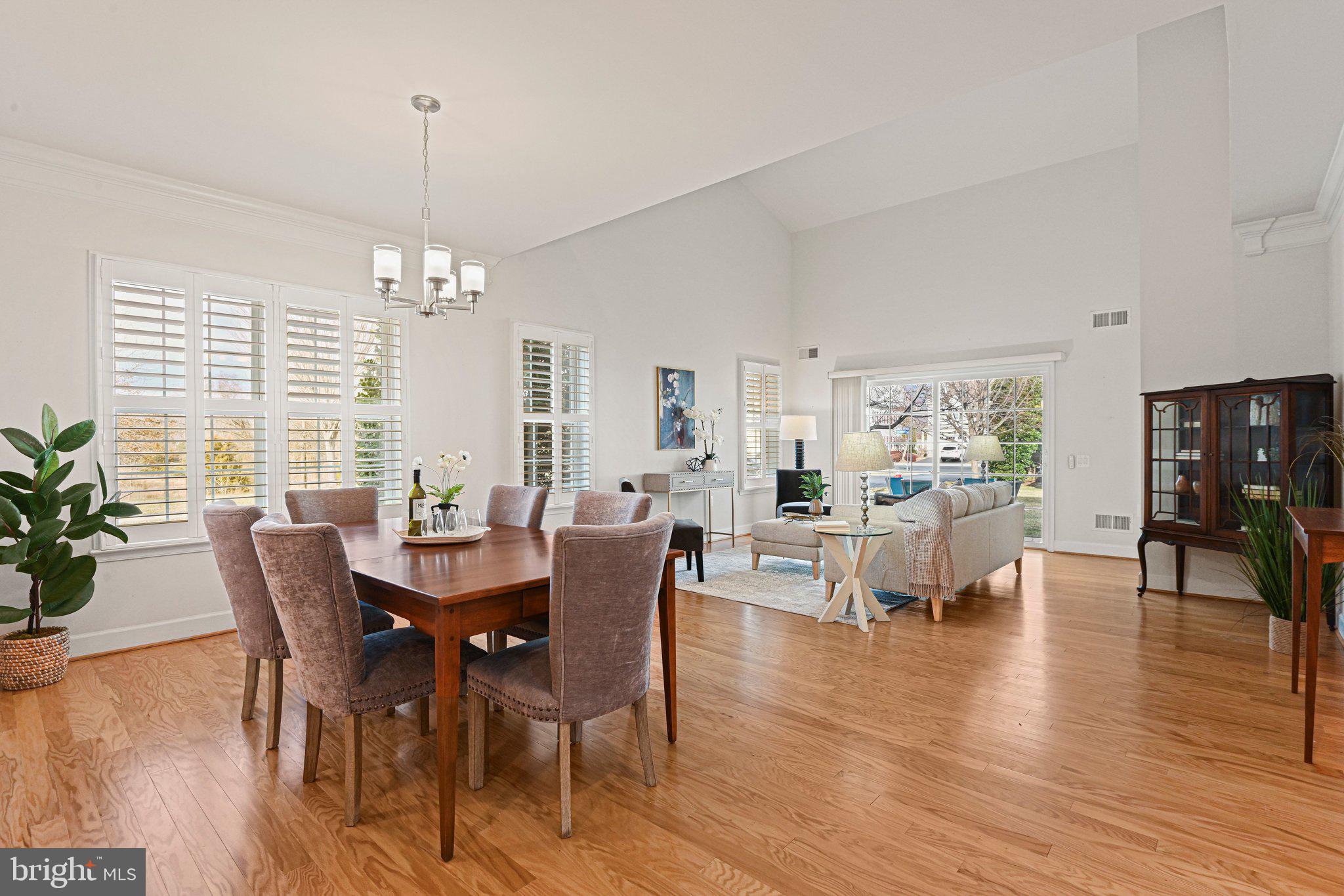44482 Maltese Falcon Square Ashburn, VA 20147 - Photo 8 of 71 a view of a dining room with furniture window and wooden floor