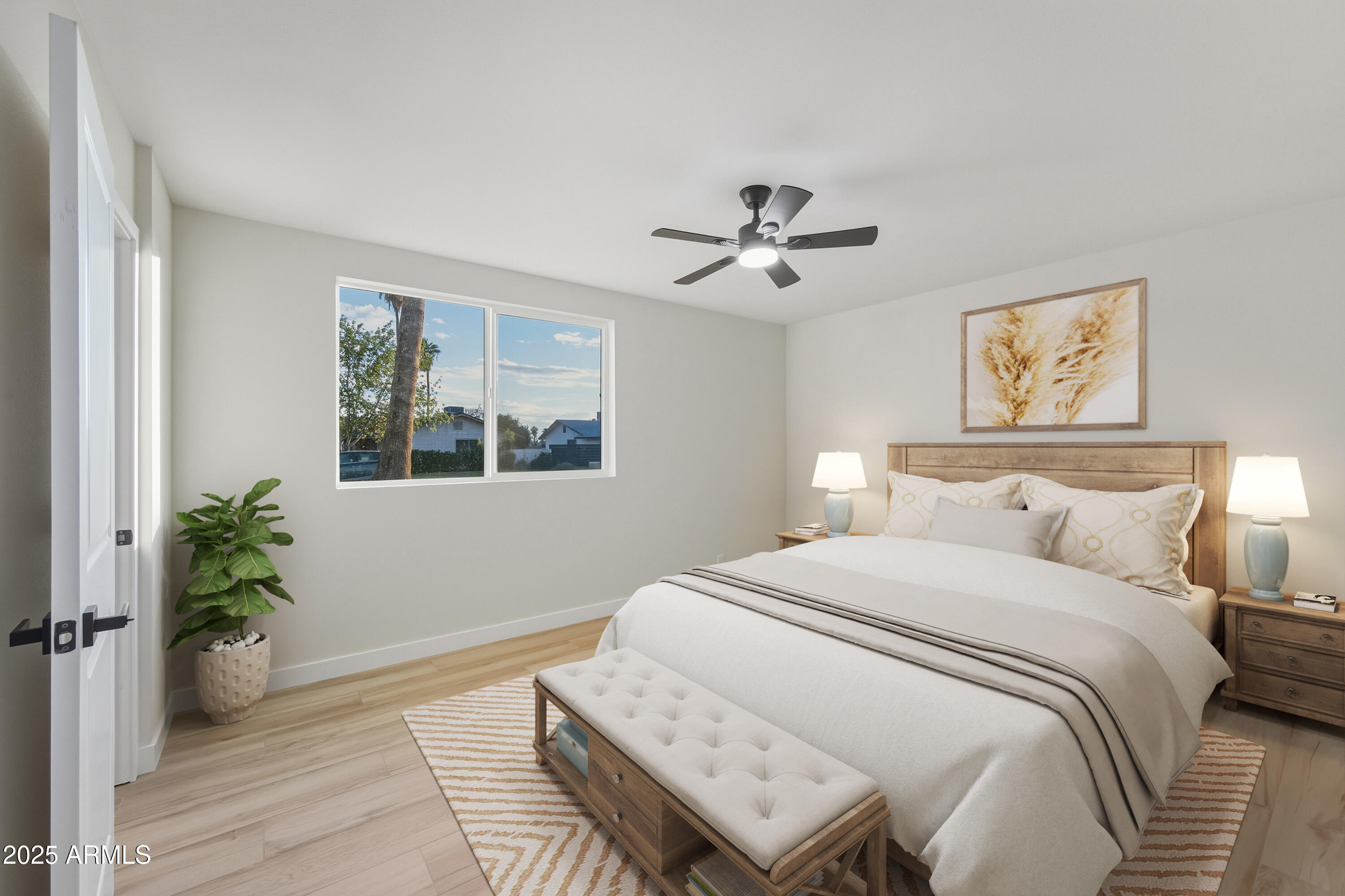 3410 West Pershing Avenue Phoenix, AZ 85029 - Photo 13 of 33 a bedroom with a large bed and a window