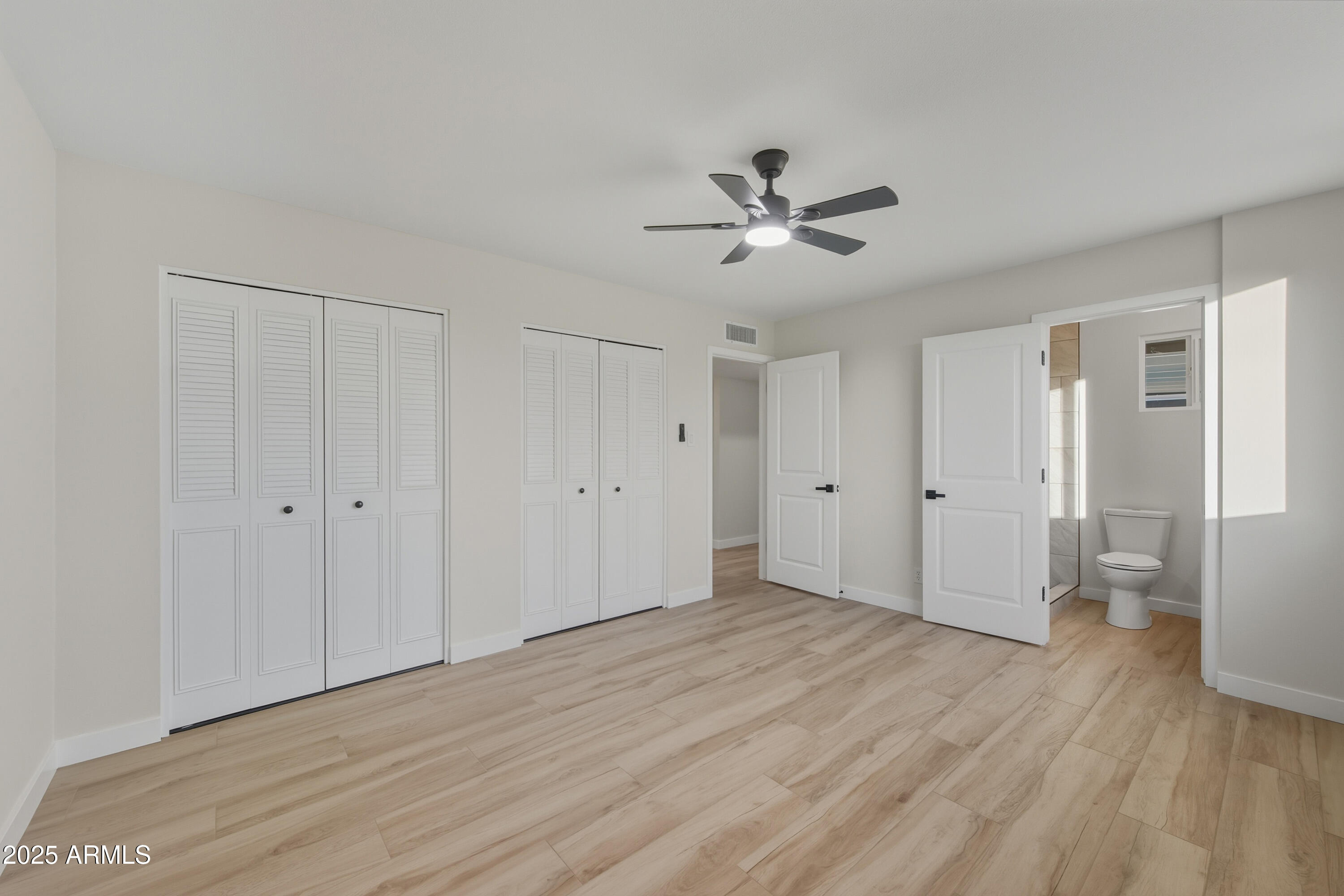 3410 West Pershing Avenue Phoenix, AZ 85029 - Photo 15 of 33 a view of empty room with wooden floor