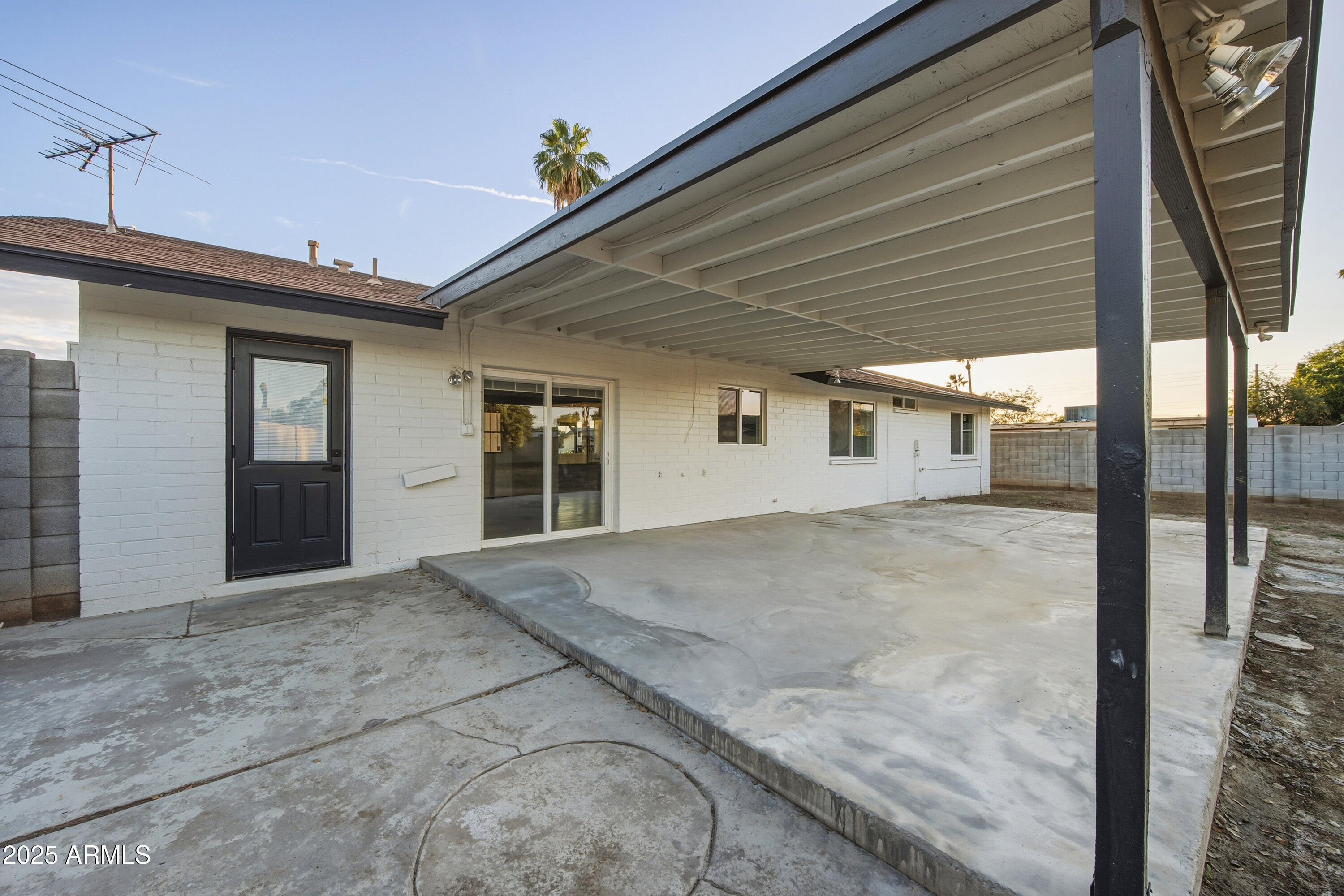 3410 West Pershing Avenue Phoenix, AZ 85029 - Photo 23 of 33 a view of a house with a backyard