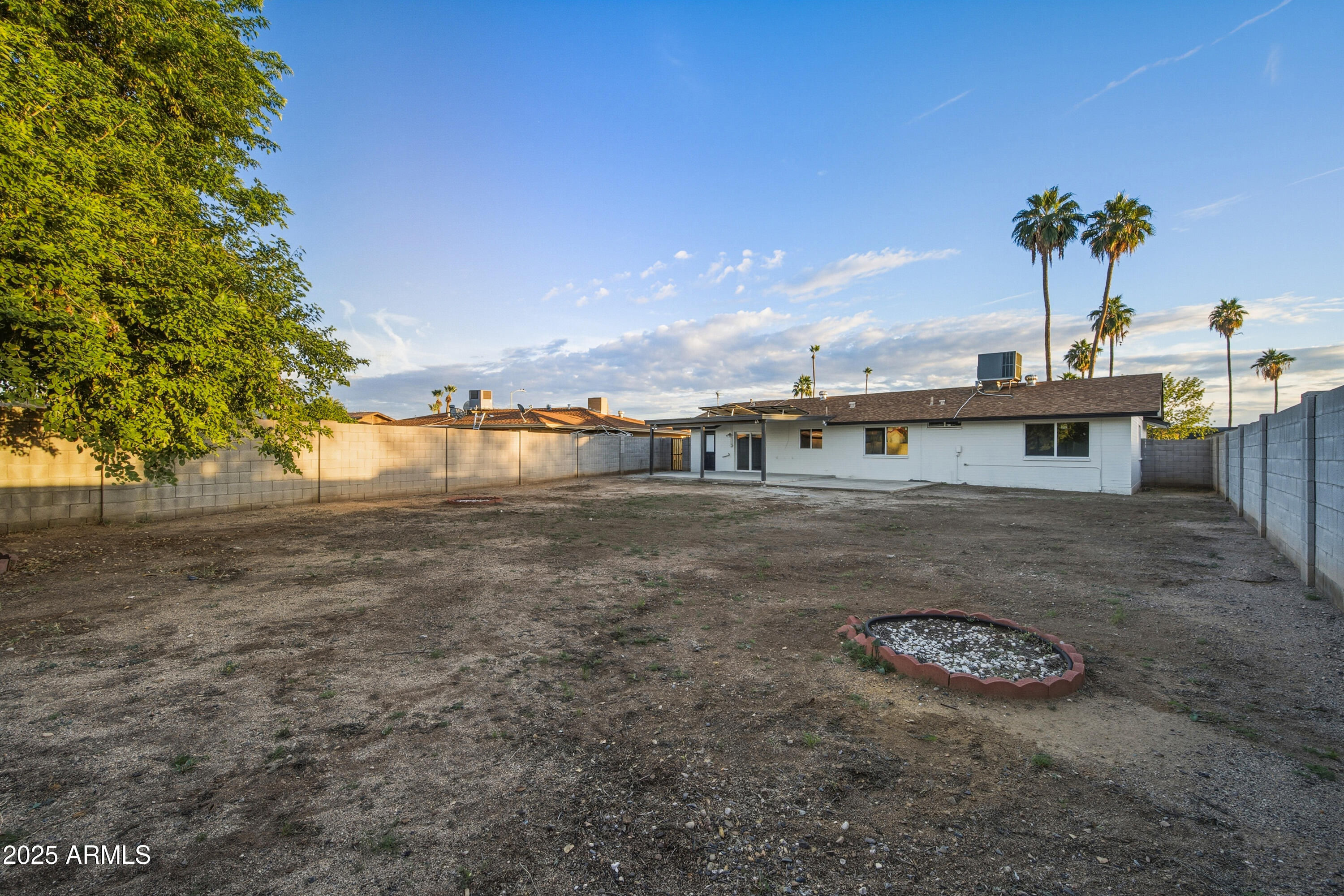 3410 West Pershing Avenue Phoenix, AZ 85029 - Photo 28 of 33 a front view of a house with garden