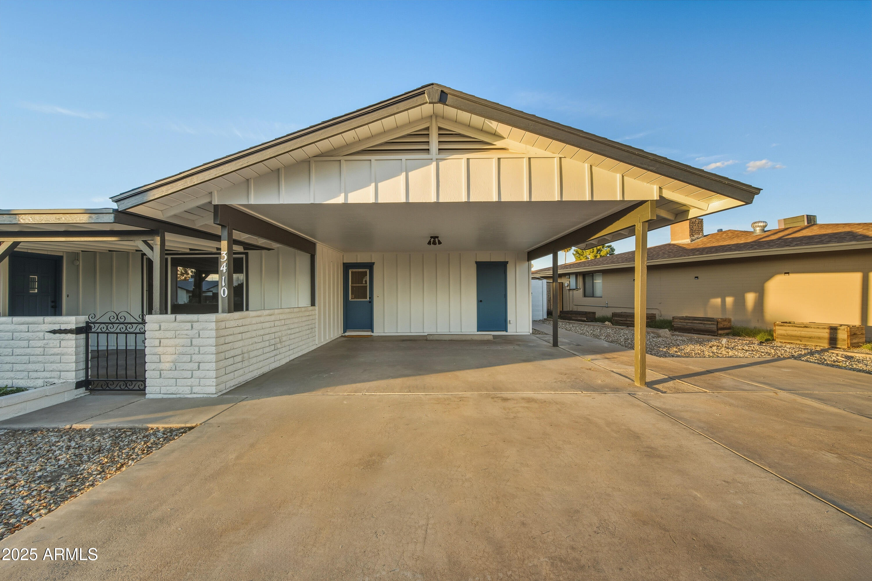 3410 West Pershing Avenue Phoenix, AZ 85029 - Photo 30 of 33 a view of a house with a patio