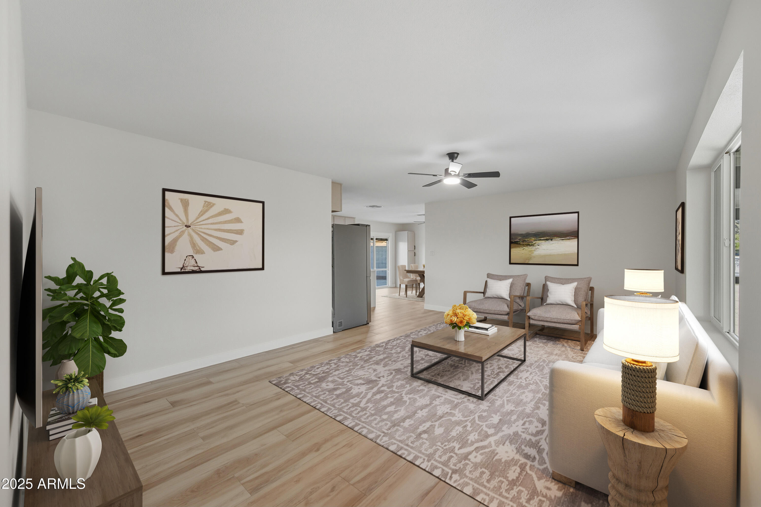 3410 West Pershing Avenue Phoenix, AZ 85029 - Photo 8 of 33 a living room with furniture and a potted plant