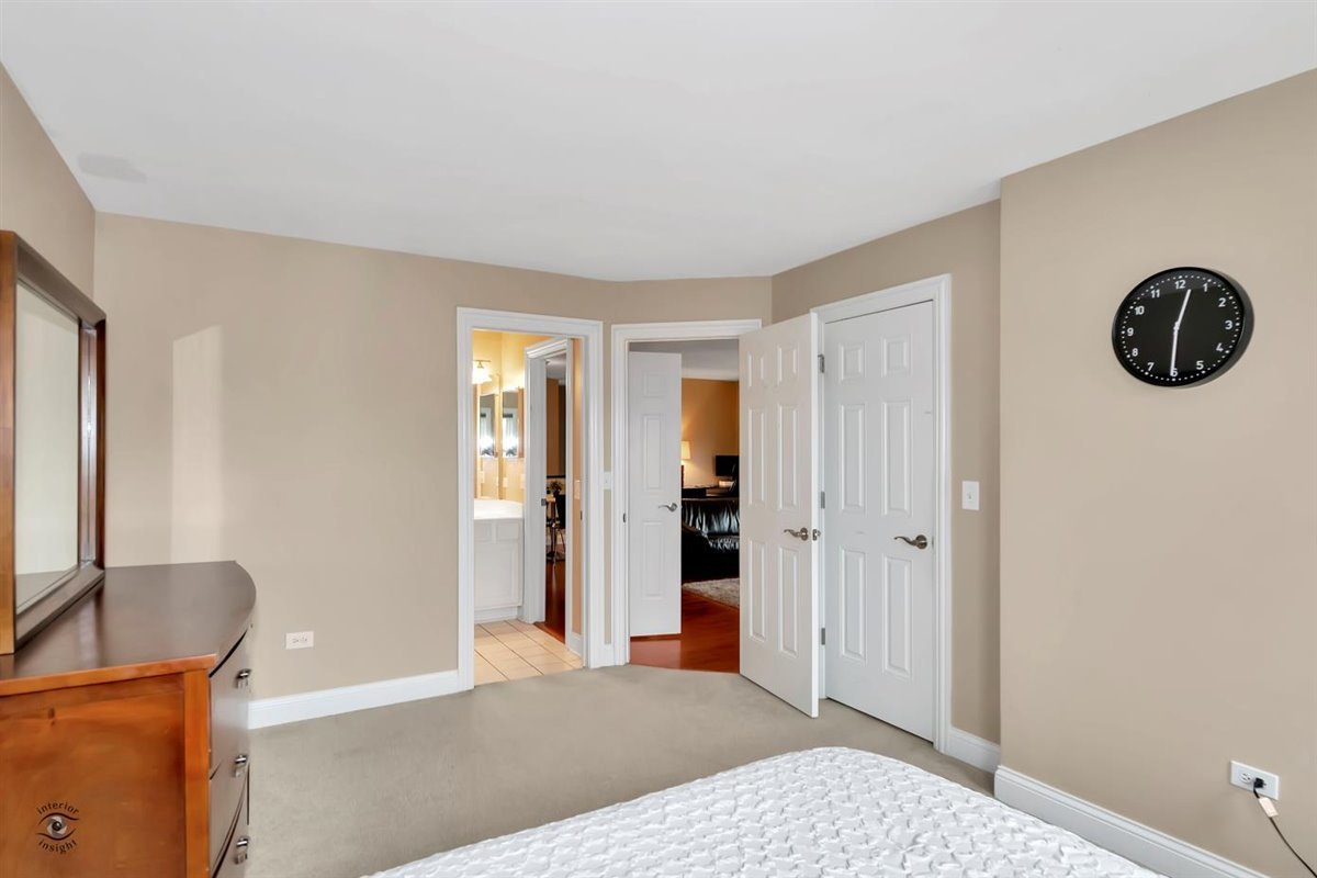43 Foxcroft Road, Unit 219 Naperville, IL 60565 - Photo 12 of 19 a view of livingroom with furniture and closet