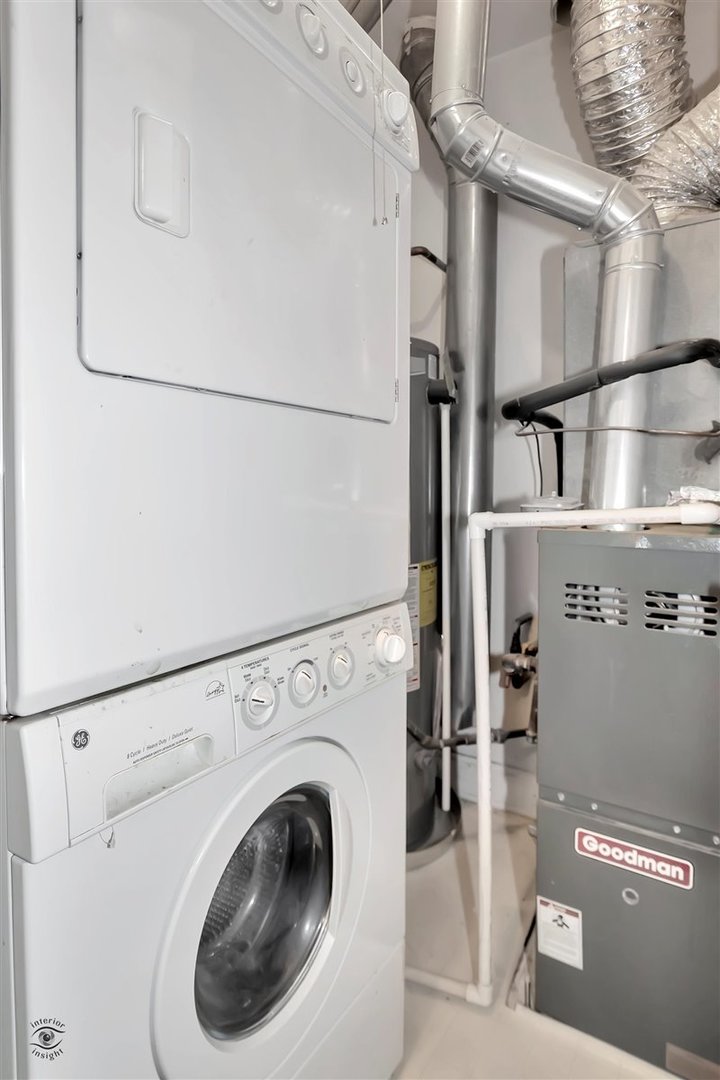 43 Foxcroft Road, Unit 219 Naperville, IL 60565 - Photo 15 of 19 a close up view of washer and dryer