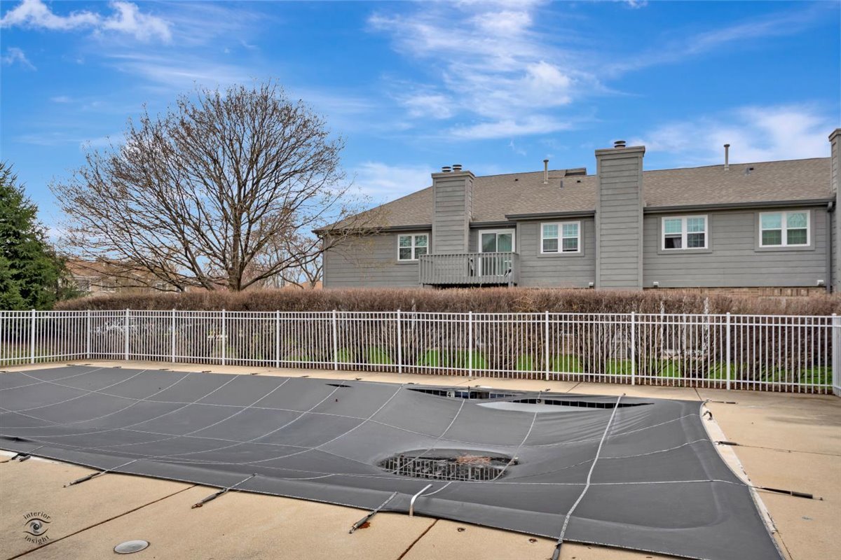 43 Foxcroft Road, Unit 219 Naperville, IL 60565 - Photo 19 of 19 a view of house with a swimming pool
