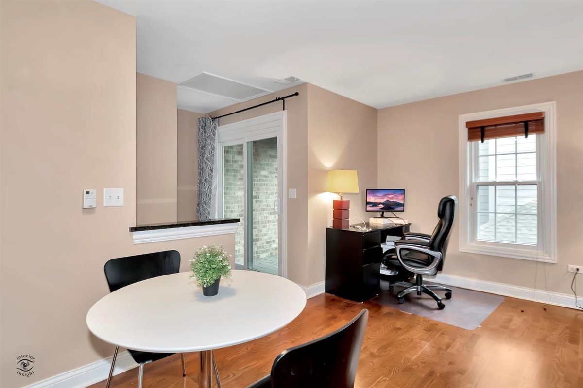 43 Foxcroft Road, Unit 219 Naperville, IL 60565 - Photo 10 of 19 a workspace with furniture and a window