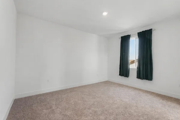 an empty room with an entryway