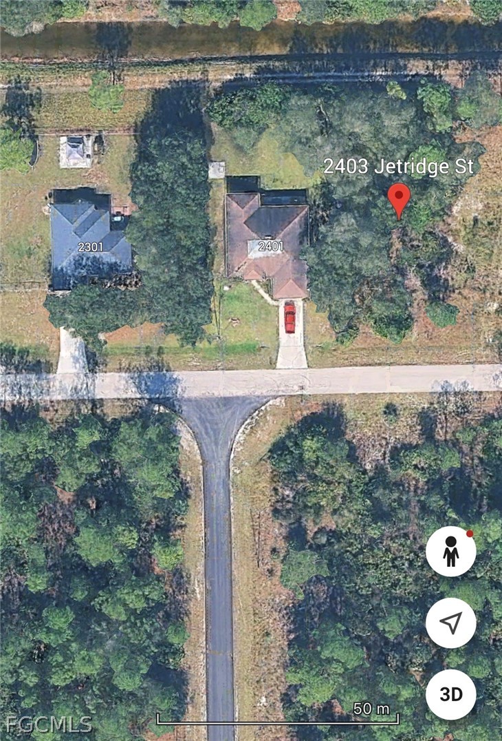 2403 Jetridge Street Alva, FL 33920 - Photo 2 of 6 an aerial view of a house with a yard