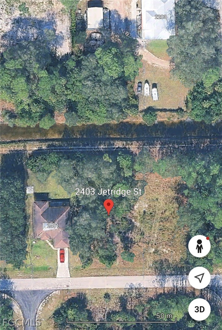 2403 Jetridge Street Alva, FL 33920 - Photo 4 of 6 an aerial view of residential house with outdoor space