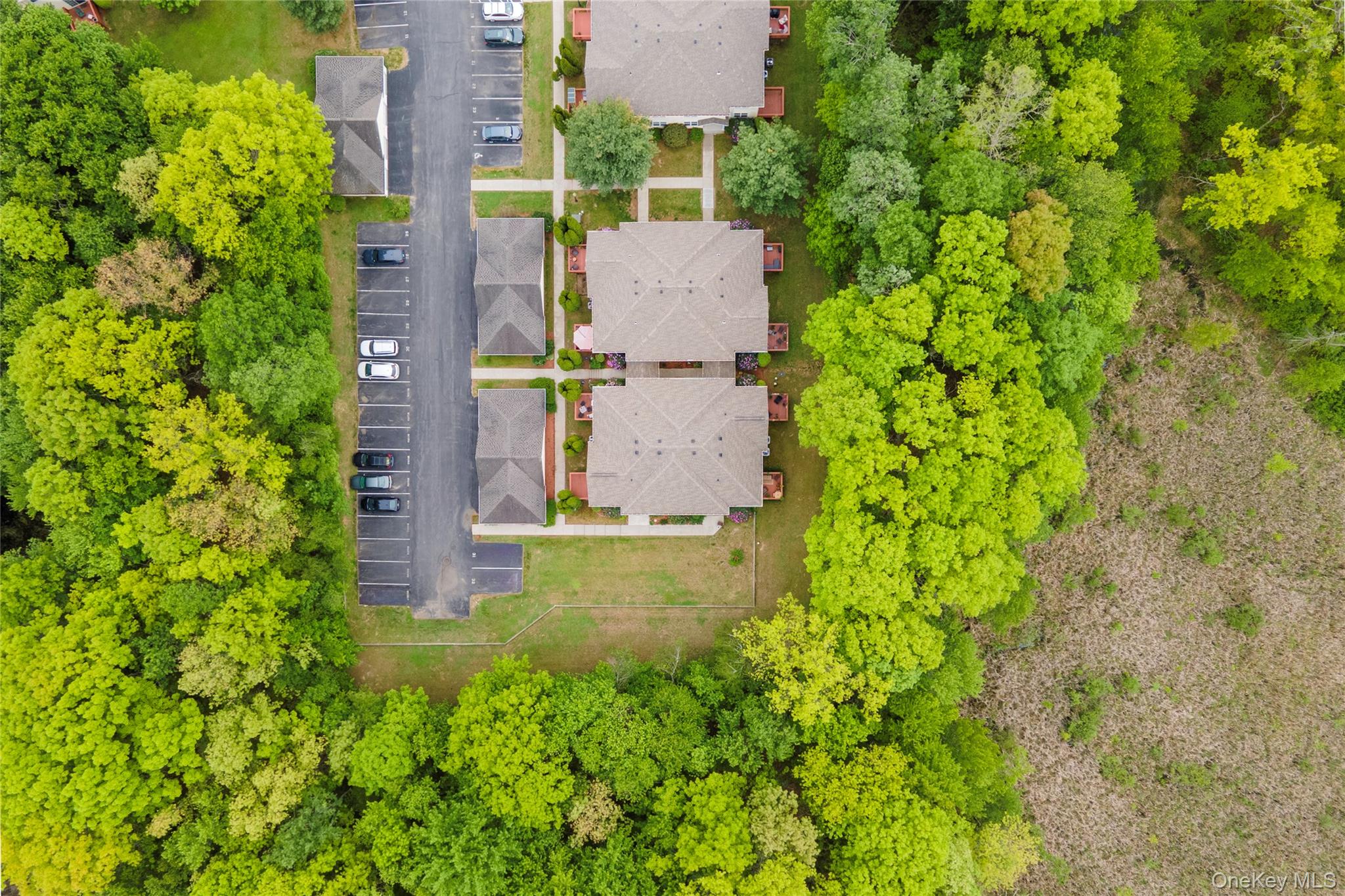 129 Stringham Road, Unit 31 LaGrangeville, NY 12540 - Photo 26 of 26 an aerial view of a house with a garden