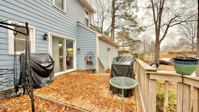 a view of a patio with chair and tables