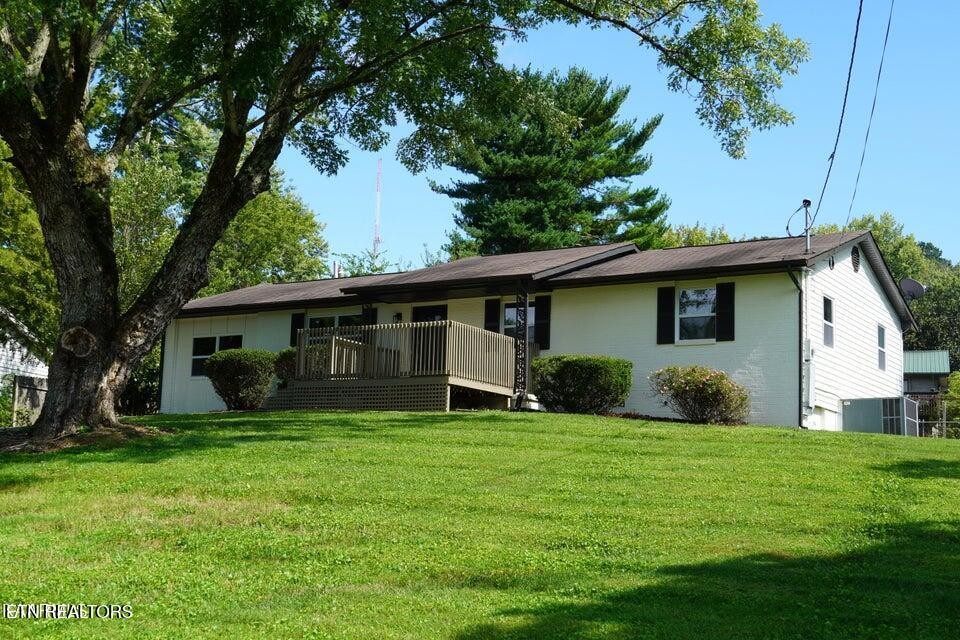 228 Brampton Road Knoxville, TN 37934 - Photo 1 of 23 a view of a house with a yard