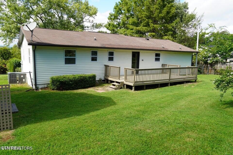 228 Brampton Road Knoxville, TN 37934 - Photo 13 of 23 a view of a backyard with a garden