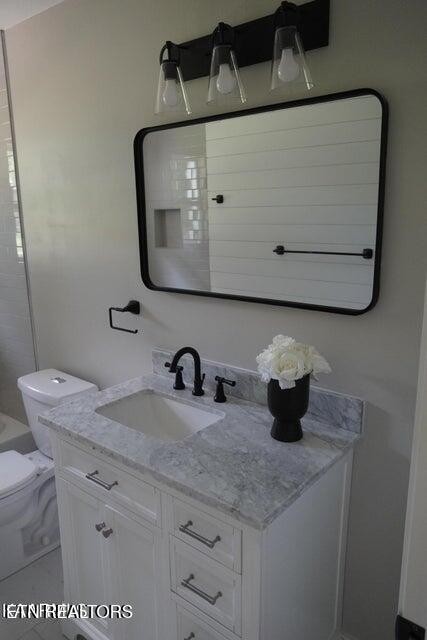 228 Brampton Road Knoxville, TN 37934 - Photo 17 of 23 a bathroom with a sink and mirror