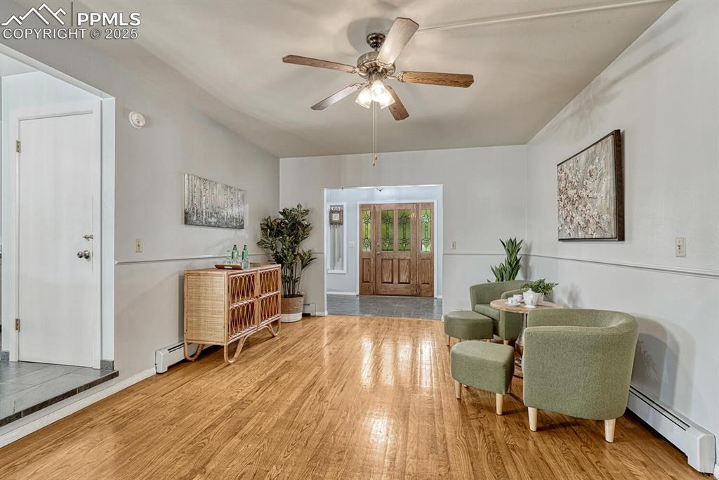 4307 Valli Vista Road Colorado Springs, CO 80915 - Photo 6 of 47 a living room with furniture and a table