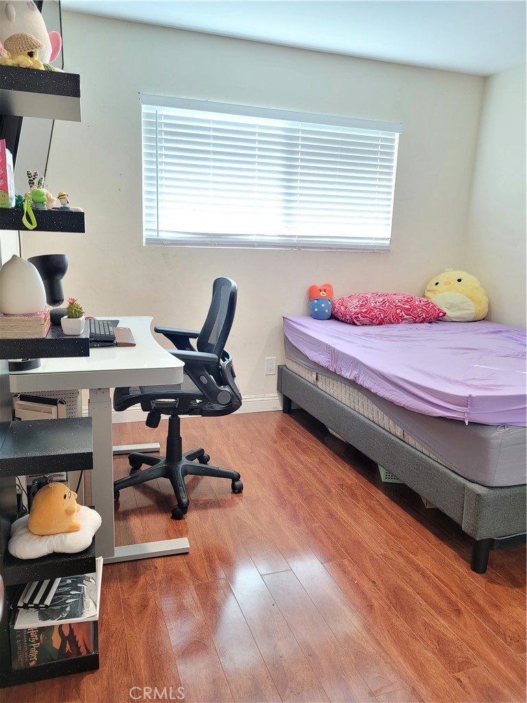 11896 Firebrand Circle Garden Grove, CA 92840 - Photo 24 of 37 a bedroom with furniture and a window