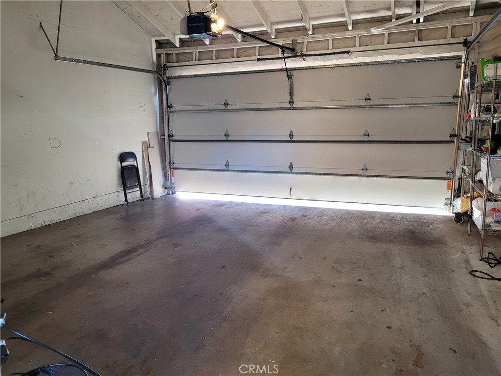 11896 Firebrand Circle Garden Grove, CA 92840 - Photo 27 of 37 a view of a room with empty racks
