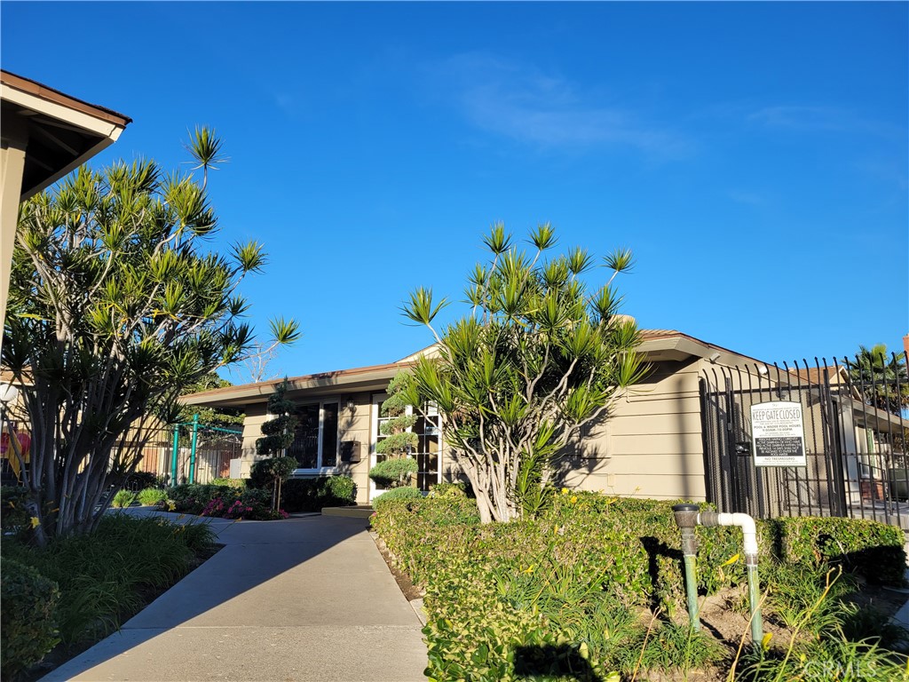 11896 Firebrand Circle Garden Grove, CA 92840 - Photo 33 of 37 a front view of a house with a yard