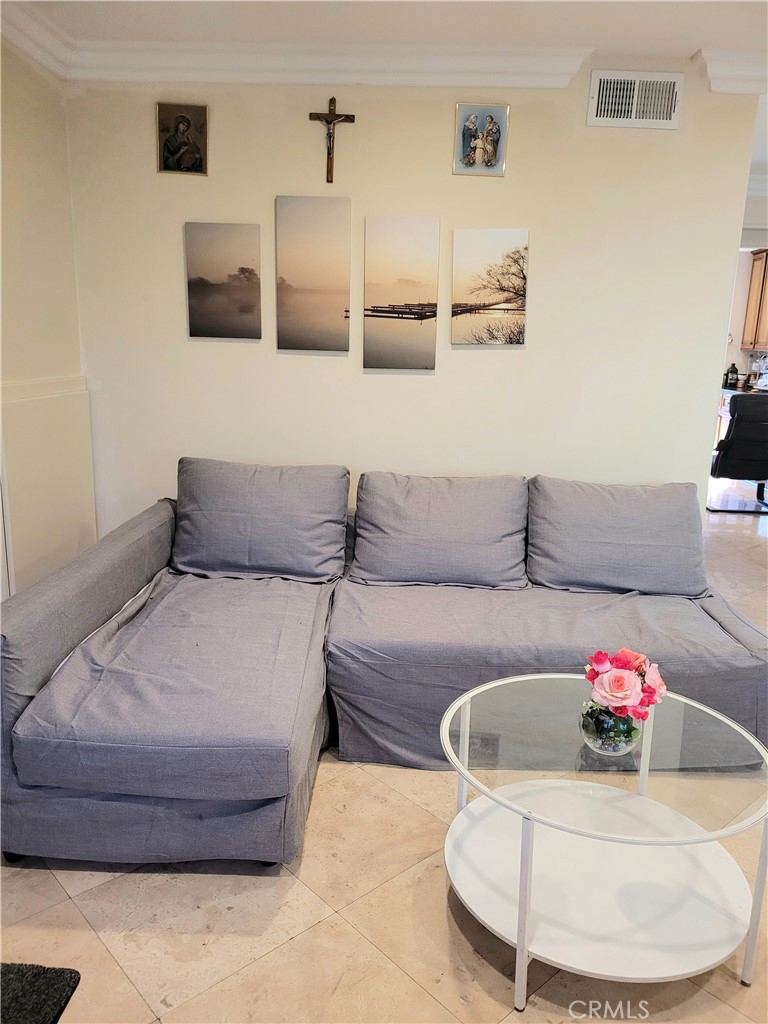 11896 Firebrand Circle Garden Grove, CA 92840 - Photo 4 of 37 a living room with furniture and a couch