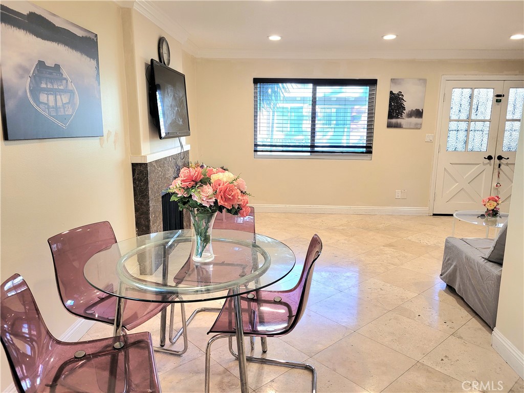 11896 Firebrand Circle Garden Grove, CA 92840 - Photo 5 of 37 a dining room with furniture and window