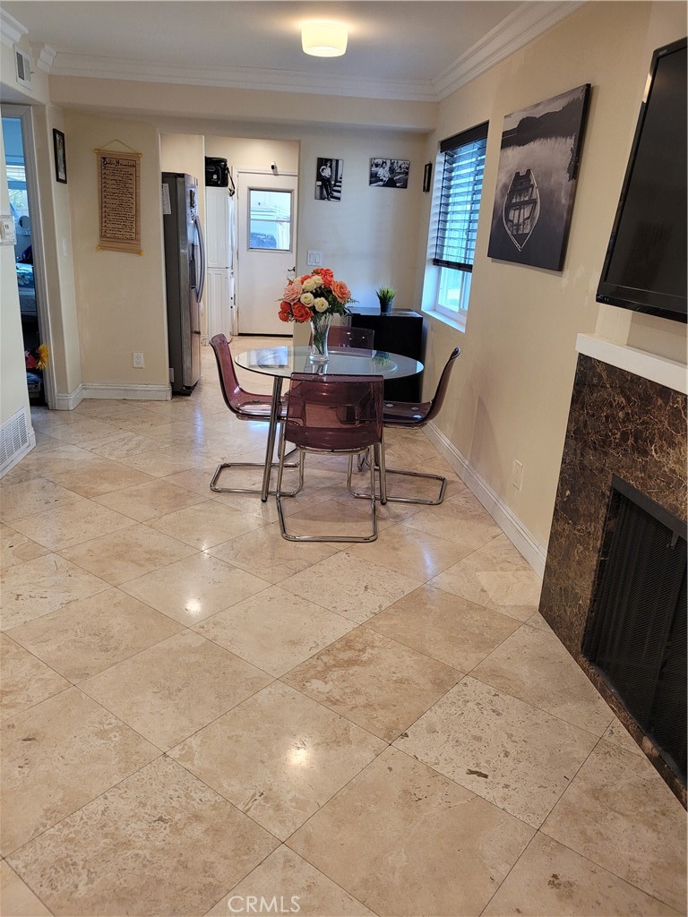 11896 Firebrand Circle Garden Grove, CA 92840 - Photo 7 of 37 a living room with furniture and a fireplace