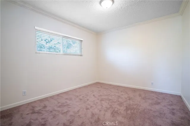 a view of a room that has a window in it