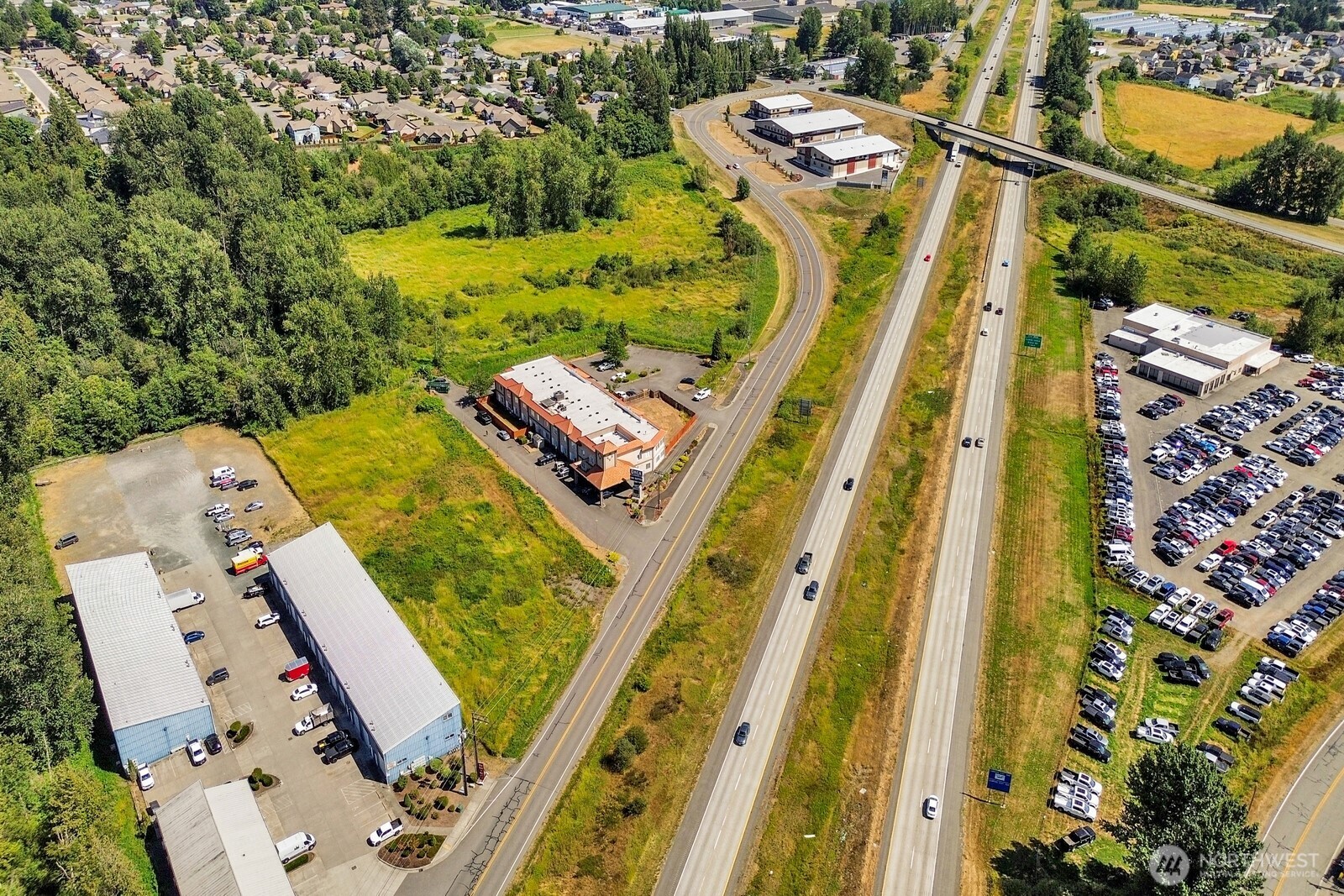 5400 Barrett Road Ferndale, WA 98248 - Photo 1 of 18 an aerial view of a residential apartment building with a yard