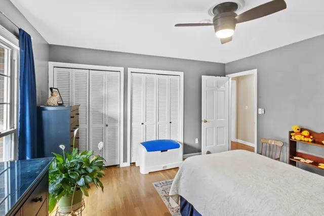 a bedroom with a bed and gym equipment