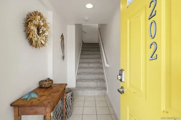 a view of entryway with wooden floor