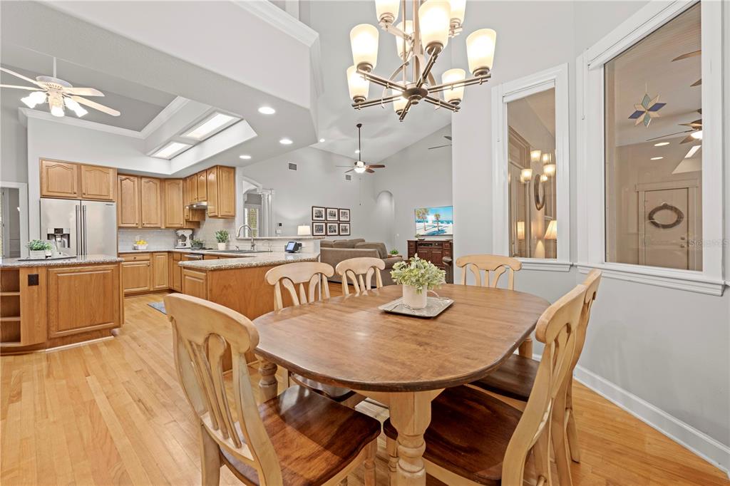 23245 Croom Road Brooksville, FL 34601 - Photo 20 of 79 a large kitchen with a table and chairs