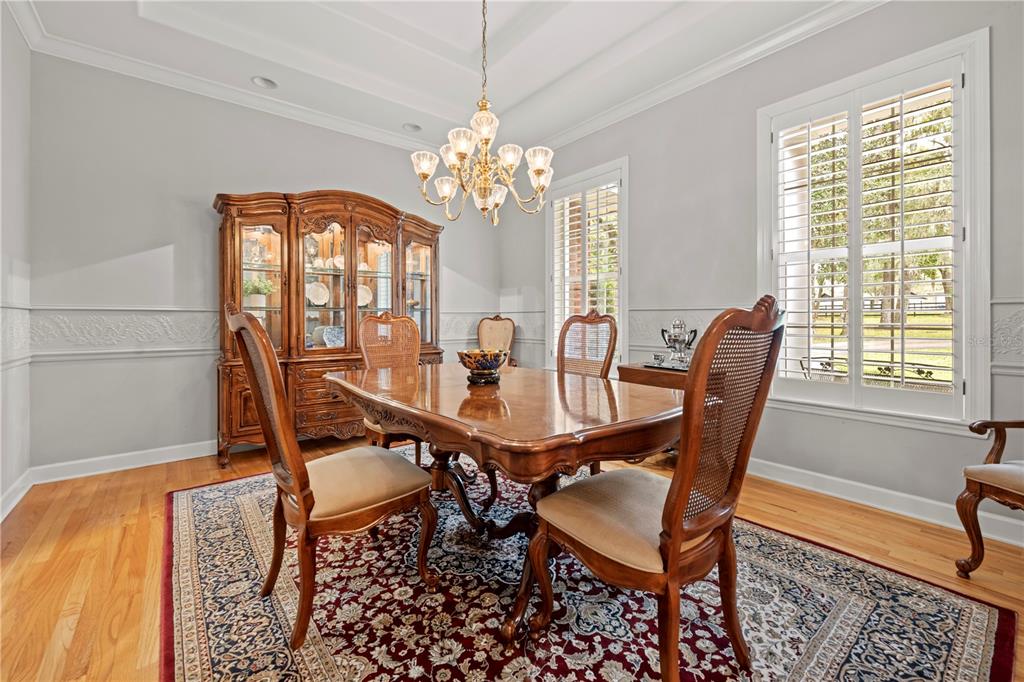 23245 Croom Road Brooksville, FL 34601 - Photo 23 of 79 a view of a dining room with furniture and window