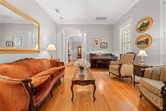 a spacious bedroom with a bed and a couch