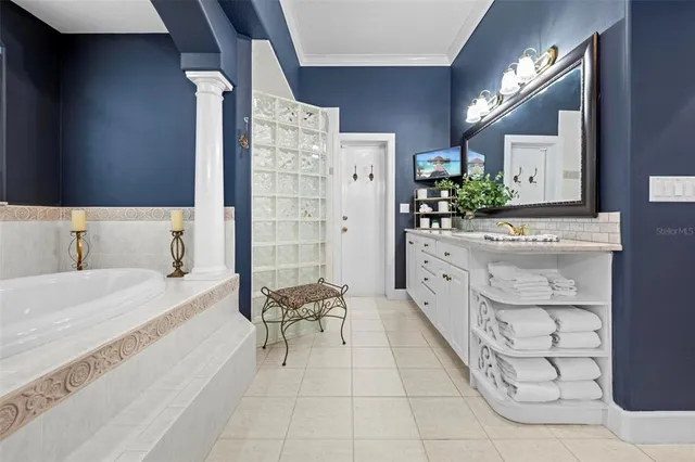 a utility room with sink dryer and washer
