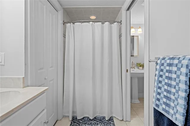 a view of a park with large trees