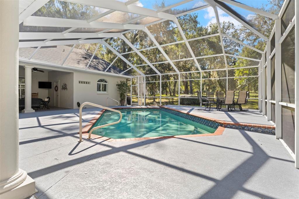 23245 Croom Road Brooksville, FL 34601 - Photo 57 of 79 a view of a porch with a patio