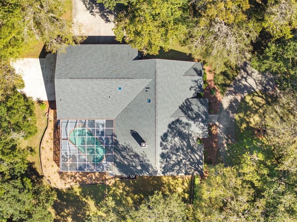 23245 Croom Road Brooksville, FL 34601 - Photo 76 of 79 a view of house along with trees