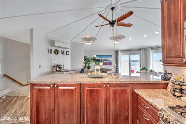 a kitchen with sink cabinets and window