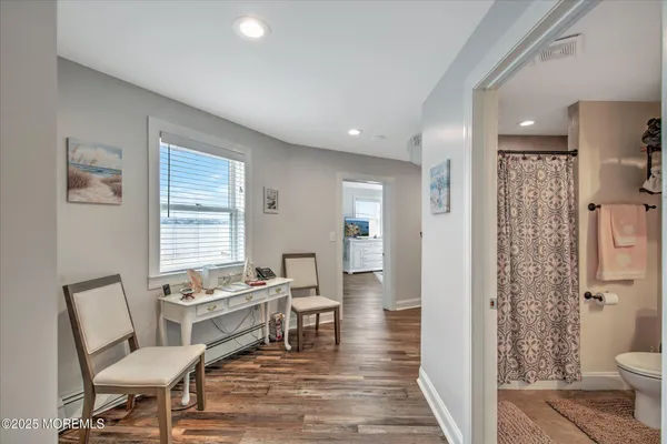 a workspace with furniture and window