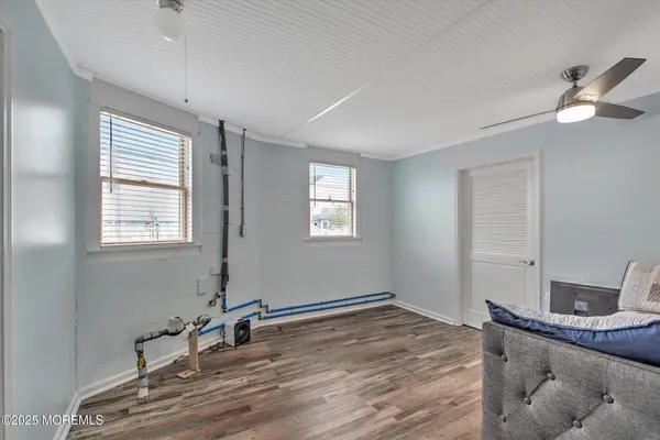 a room with a bed and a window