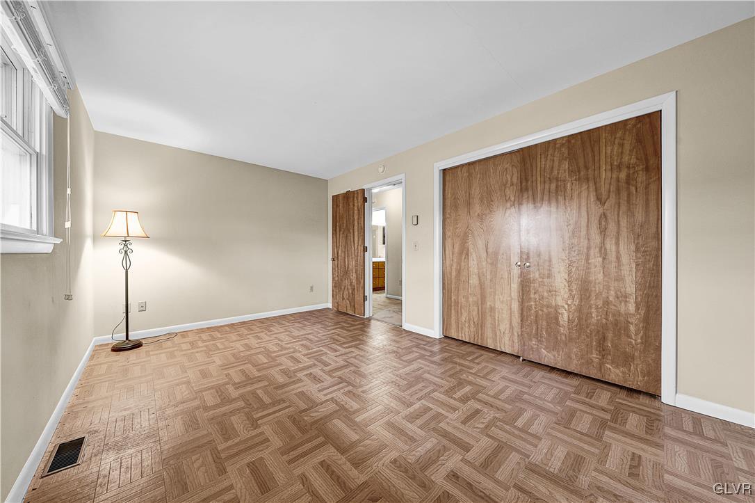 5651 Park Valley Road Schnecksville, PA 18078 - Photo 18 of 32 a view of an empty room with a window