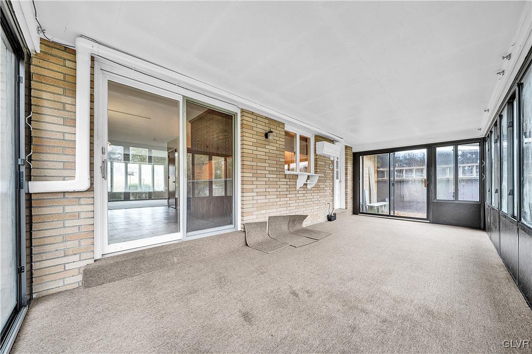 5651 Park Valley Road Schnecksville, PA 18078 - Photo 22 of 32 a view of an empty room with a window