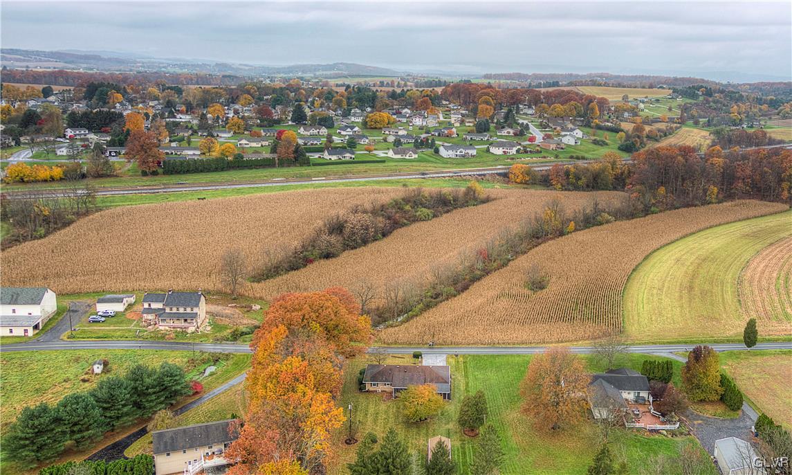 5651 Park Valley Road Schnecksville, PA 18078 - Photo 31 of 32 an aerial view of a house with a yard and lake view