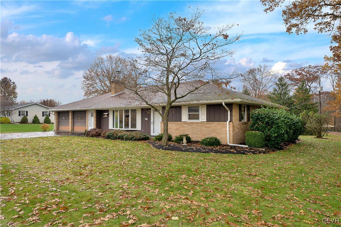 5651 Park Valley Road Schnecksville, PA 18078 - Photo 32 of 32 a front view of a house with a yard